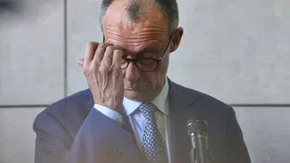 Friedrich Merz, die SPD und die Fahne im Wind
