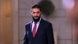 Syriens Übergangspräsident erstmals in Europa