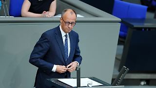 Merz lobt Scholz' Reaktion auf Krieg als "historisch"